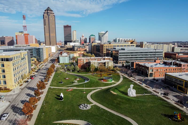 Des Moines skyline with aerial view of Pappajohn Sculpture Park.